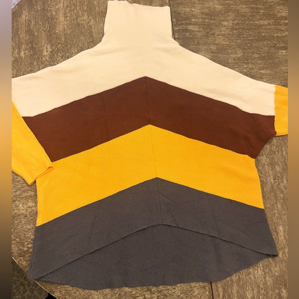 Oversized cozy sweater, longer back. Perfect for leggings. Lightweight but warm